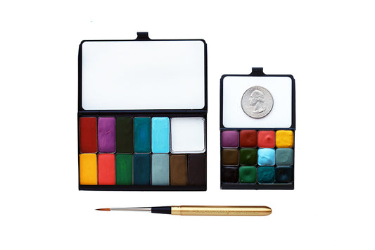 A close-up of the pre-painted swatch card for the Lands End Art Toolkit Watercolor Palettes.
