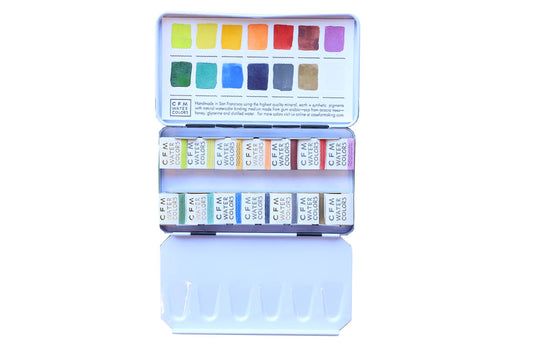Case for Making pans filled with handmade watercolor paint, ready to be placed into the 14-Color Coastal Watercolor Palette.