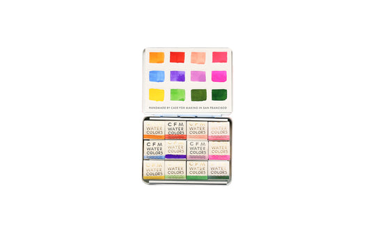 Case for Making pans filled with handmade watercolor paint, ready to be placed into the 12-Color Floral Watercolor Travel Palette.