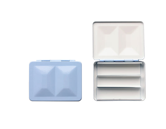 The CfM Simple Travel Palette in Glossy Iris Blue. Shown closed and open, side by side. The open case features wells in the lid for mixing colors and can fit a removable swatch card.