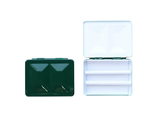 The CfM Simple Travel Palette in Glossy Cypress Green. Shown closed and open, side by side. The open case features wells in the lid for mixing colors and can fit a removable swatch card.