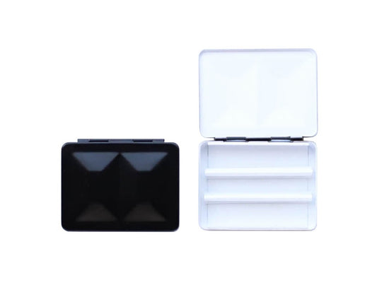 The CfM Simple Travel Palette in Glossy Black. Shown closed and open, side by side. The open case features wells in the lid for mixing colors and can fit a removable swatch card.