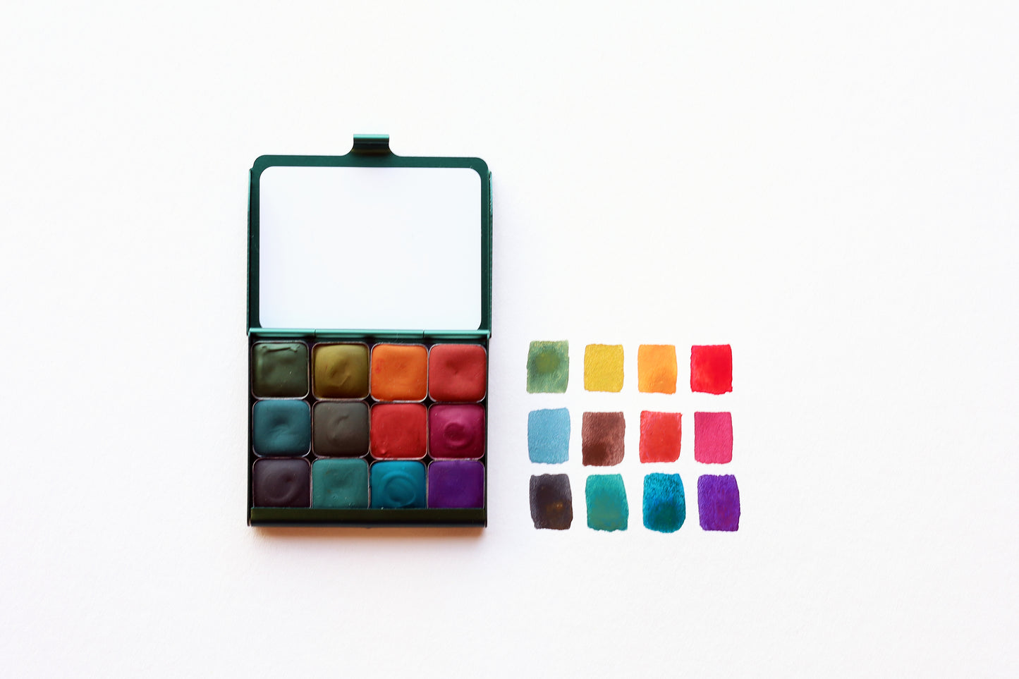Case for Making pans filled with handmade watercolor paint, ready to be placed into the Ultra-Blends Art Toolkit Watercolor Palettes.