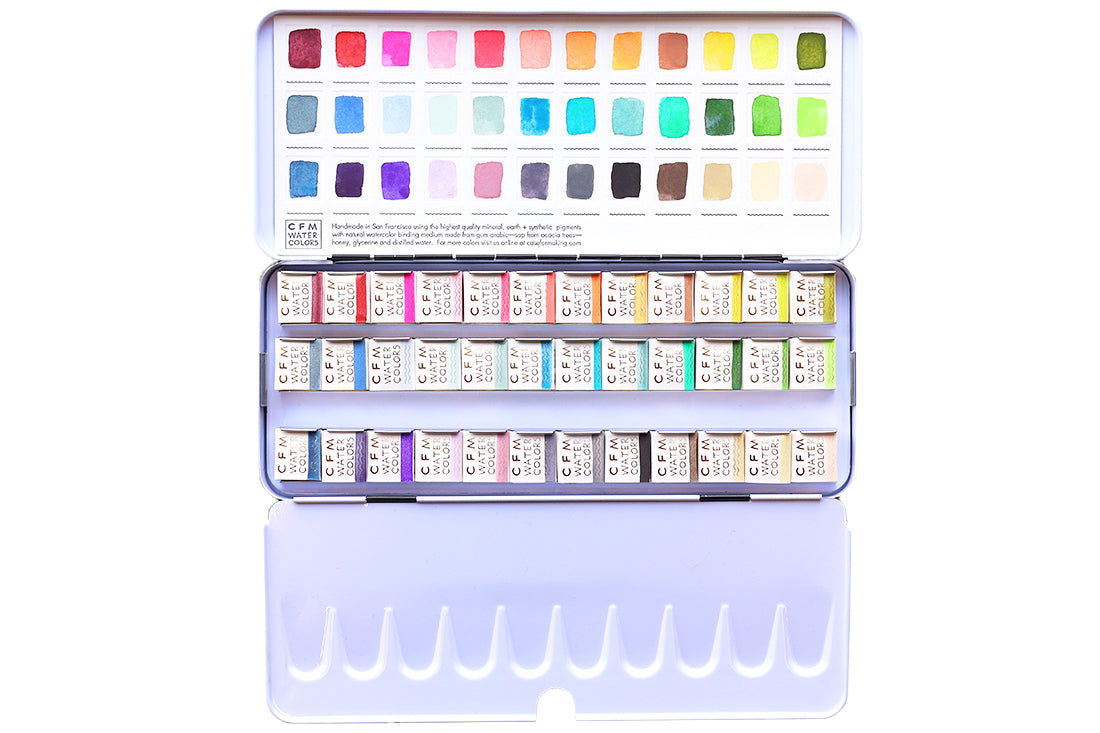 Case for Making pans filled with handmade watercolor paint, ready to be placed into the 36-Color Ultimate Feels Blends Watercolor Palette.
