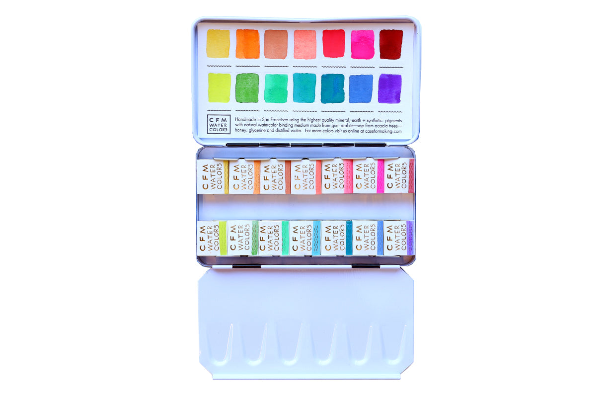 Case for Making pans filled with handmade watercolor paint, ready to be placed into the 14-Color Bright Blends Watercolor Palette.