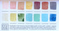 A close-up of the pre-painted swatch card for the 14-Color Desert Watercolor Palette.