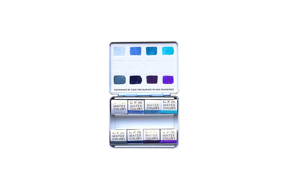 Case for Making pans filled with handmade watercolor paint, ready to be placed into the 8-Color Monochromatic Blue Watercolor Travel Palette.