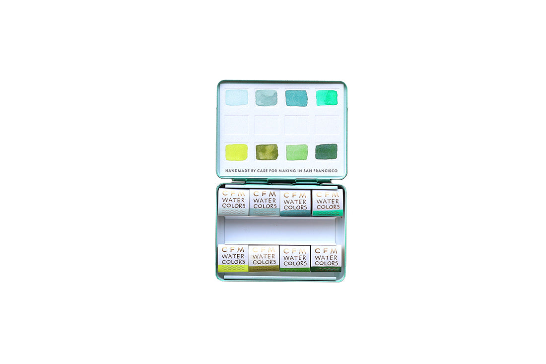 Case for Making pans filled with handmade watercolor paint, ready to be placed into the 8-Color Monochromatic Green Watercolor Travel Palette.