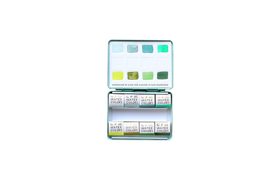 Case for Making pans filled with handmade watercolor paint, ready to be placed into the 8-Color Monochromatic Green Watercolor Travel Palette.