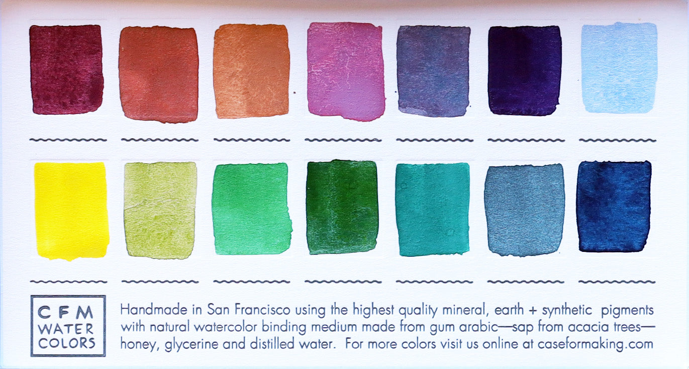 A close-up of the pre-painted swatch card for the 14-Color Muted Blends Watercolor Palette.