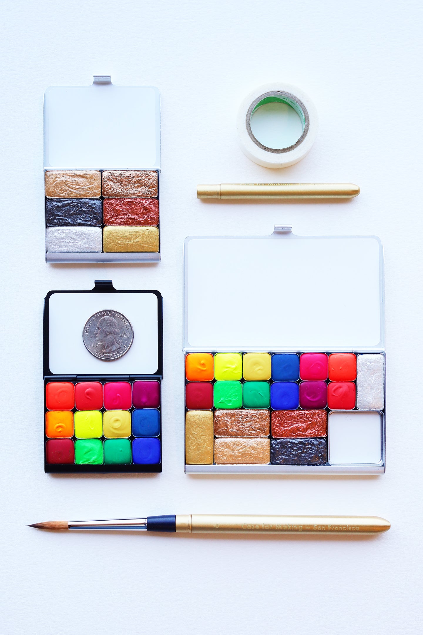 Case for Making pans filled with handmade watercolor paint, ready to be placed into the Metallics Art Toolkit Watercolor Palette.