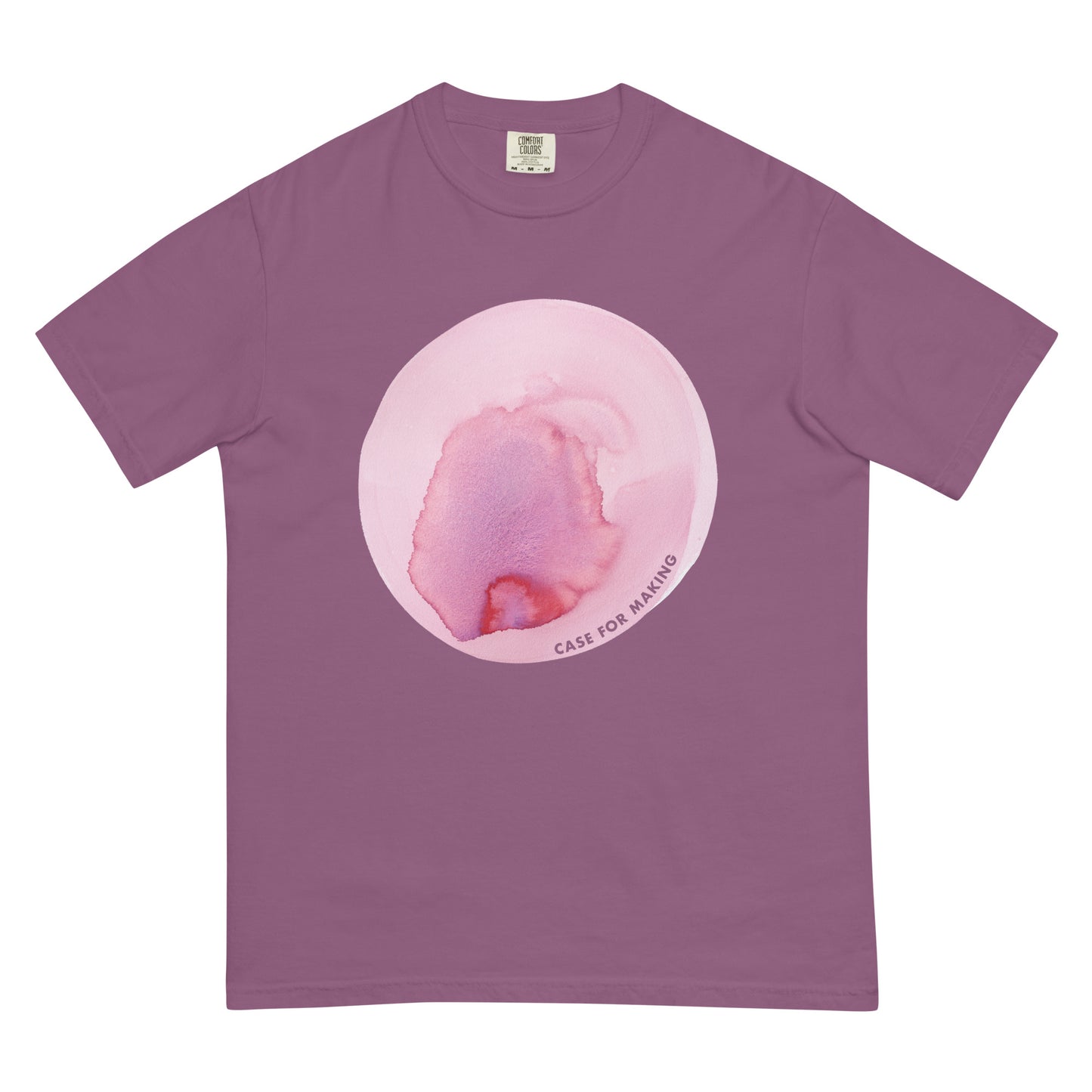 The CfM Blossom Circle Swatch Tee, a Comfort Colors t-shirt printed with a large circle swatch of CfM Blossom watercolor paint.