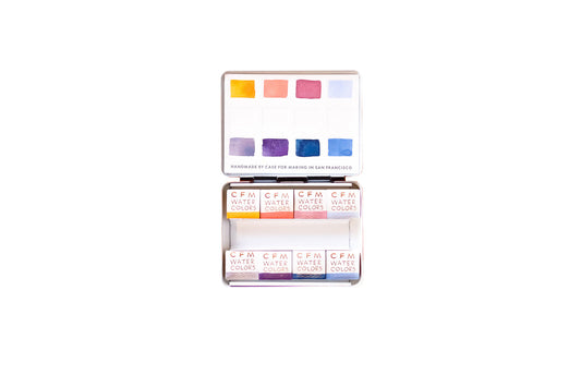 Case for Making pans filled with handmade watercolor paint, ready to be placed into the 8-Color Dusk Watercolor Travel Palette.