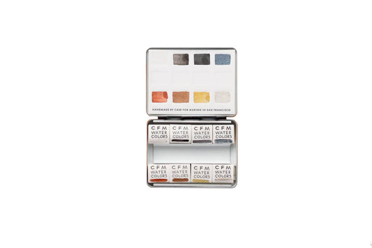 Case for Making pans filled with handmade watercolor paint, ready to be placed into the 8-Color Monochromatic Black/White/Metallic Watercolor Travel Palette.