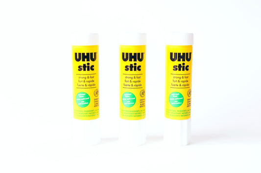 UHU Glue Stick, quick-setting adhesive for paper, cardboard, photos, and more! These twistable glue sticks are non-toxic, non-staining, and washable!