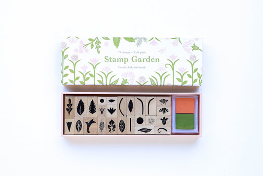 Stamp Garden Stamp Set, cultivate your dream garden with this botanical stamp set! Includes 25 stamps and a 2-color pink/green ink pad.