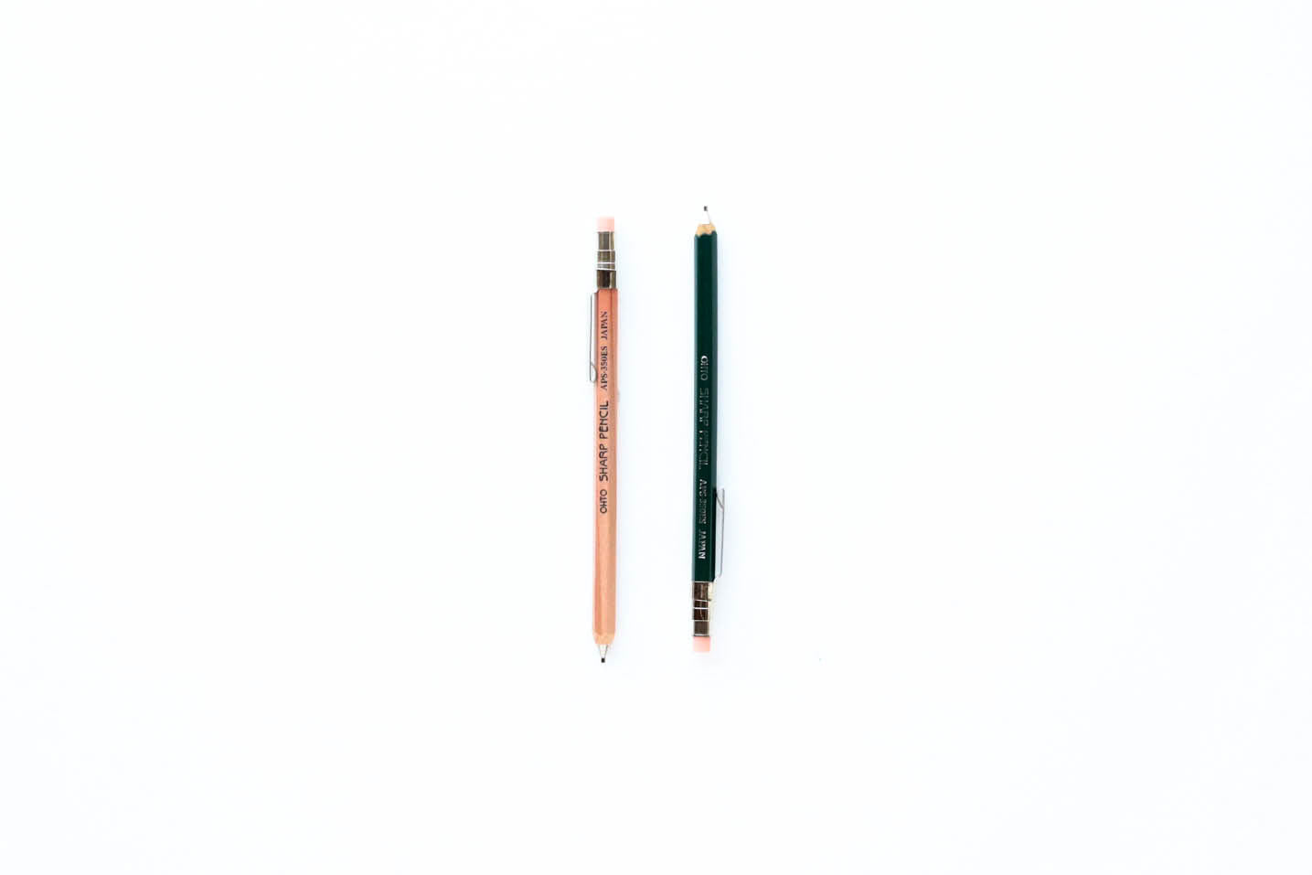 Ohto Mini Mechanical Pencil, by far the cutest and tiniest pencil we carry! Available in 2 variations: natural or dark green with .5mm lead. Made in Japan.