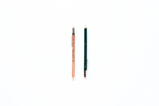Ohto Mini Mechanical Pencil, by far the cutest and tiniest pencil we carry! Available in 2 variations: natural or dark green with .5mm lead. Made in Japan.
