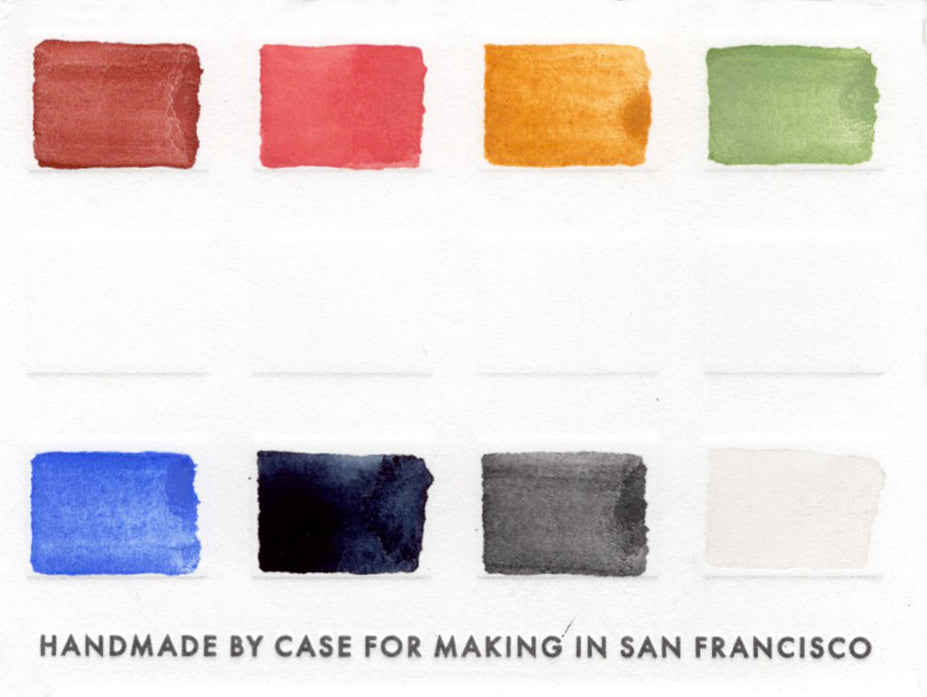 Close-up of the swatch card for the 8 Combo Color Travel Set that features 8 warm to cool toned colors.