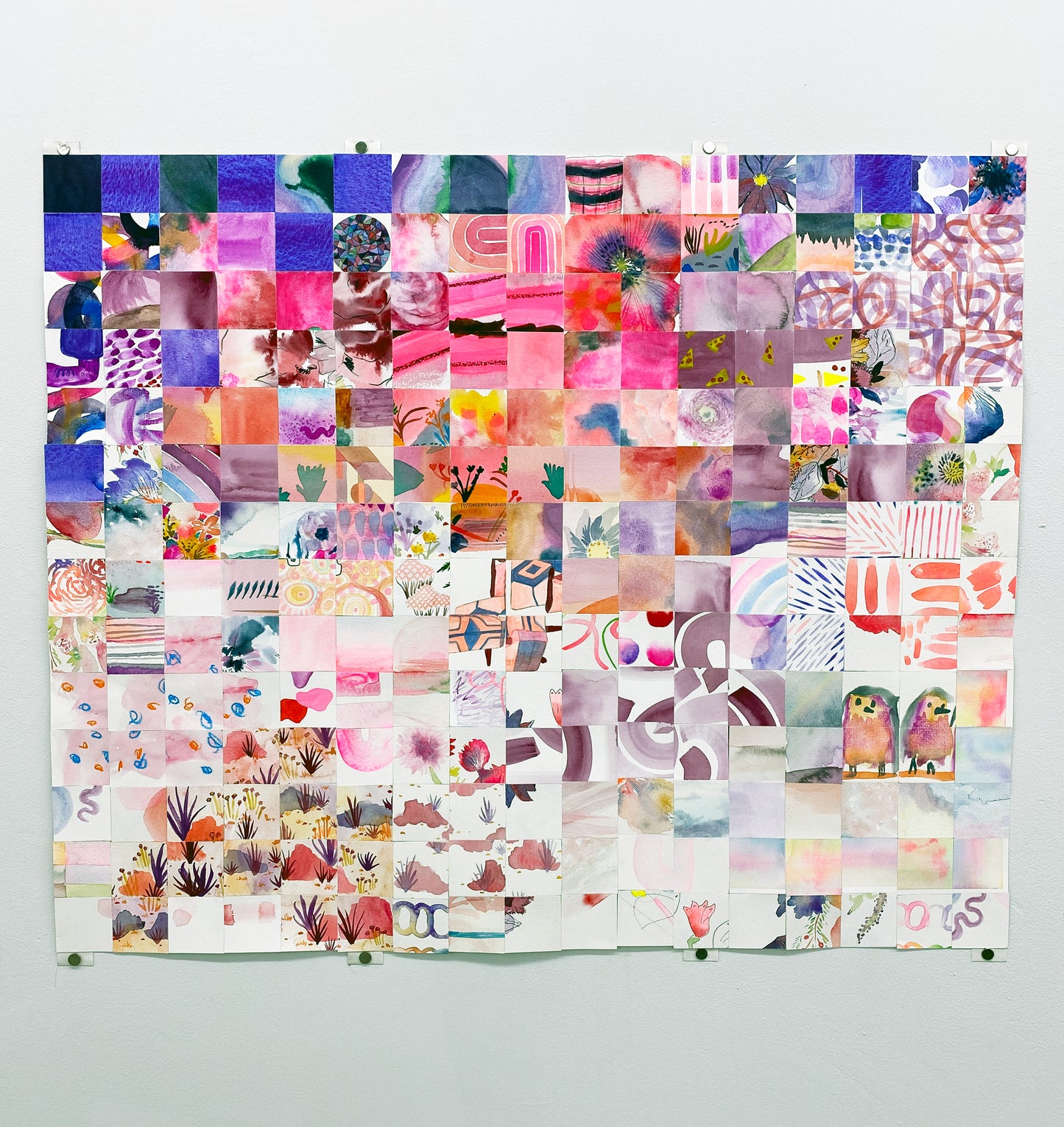Pink/Purple Quilt, this large paper quilts is composed of many 2" x 2" squares of original watercolor artwork sent to us by our amazing…